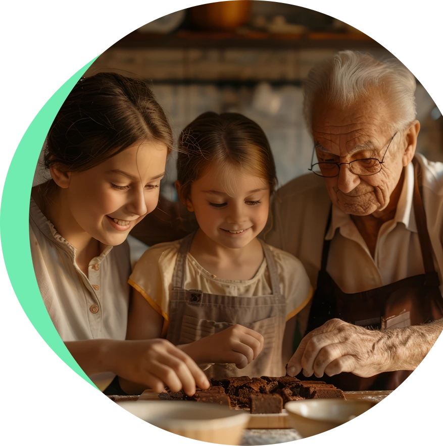 Grandfather baking with two young girls, smiling together in a cozy kitchen — symbolizing family bonding and intergenerational connection.